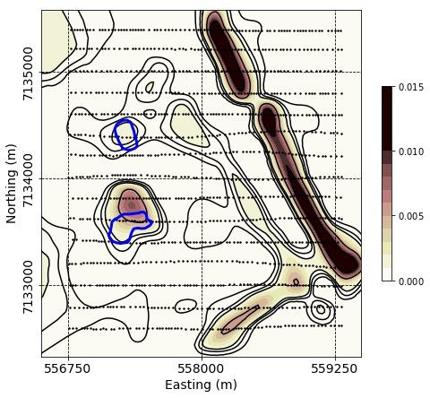 Final mixed-norm susceptibility model recovered over the DO-18/27 kimberlite pipes shown with blue outlines.