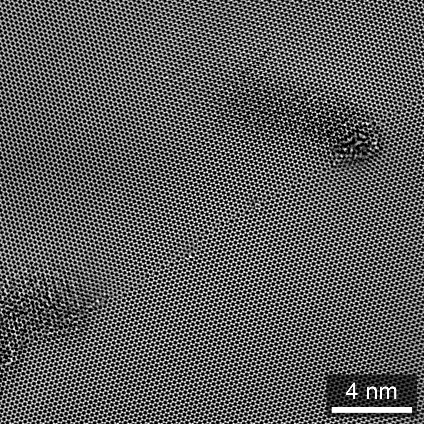 Exit wave amplitude of a single-layer graphene GB, from HRTEM focal series reconstruction. Adapted from .