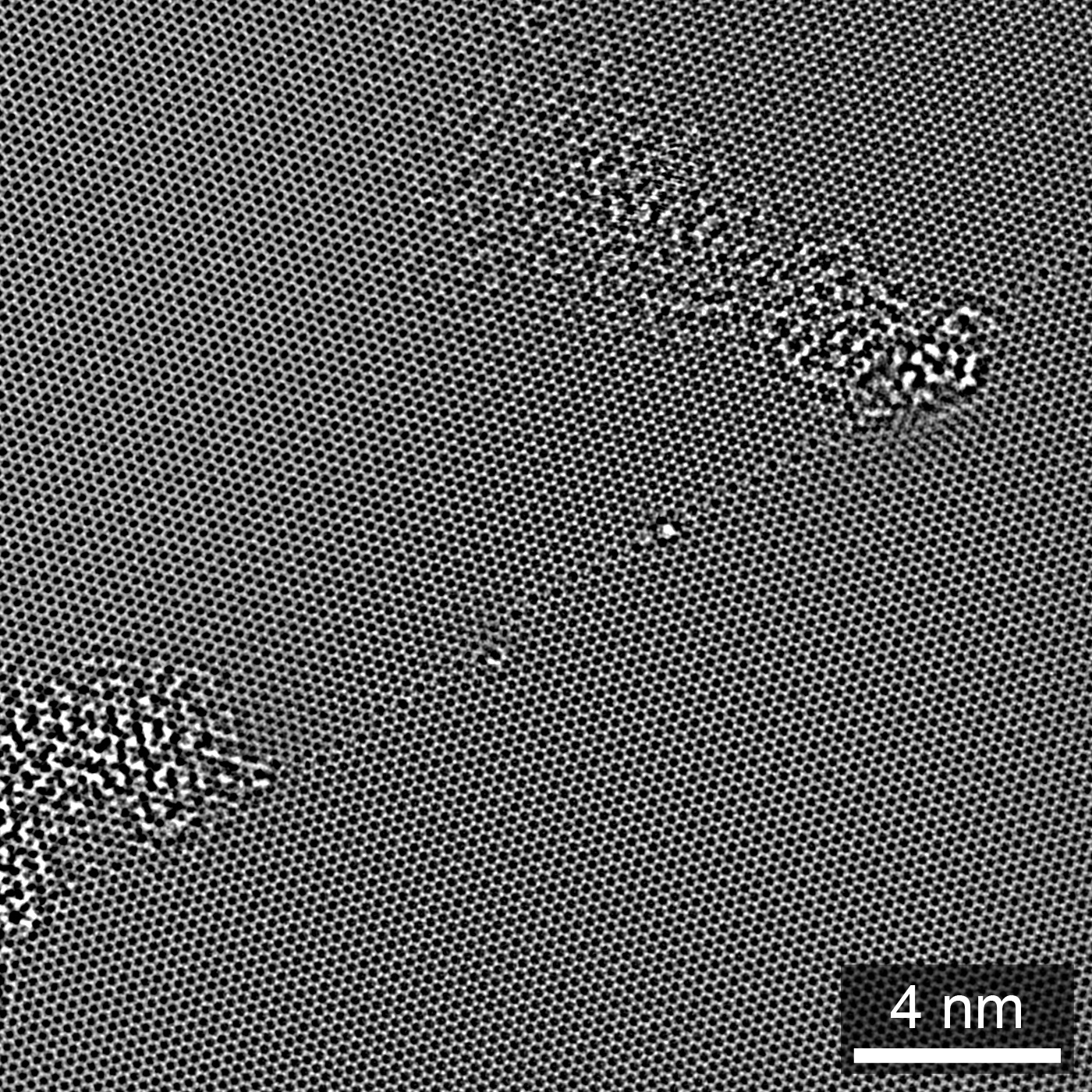 Exit wave phase of a single-layer graphene GB, from HRTEM focal series reconstruction. Adapted from .