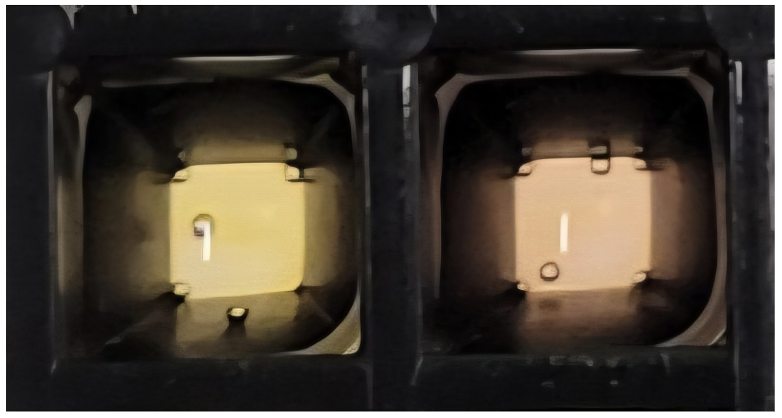 pH-responsive synthetic cell-mediated visible color change via a two-vesicle system in solution at pH 7.6 (left) and pH 6.3 (right).